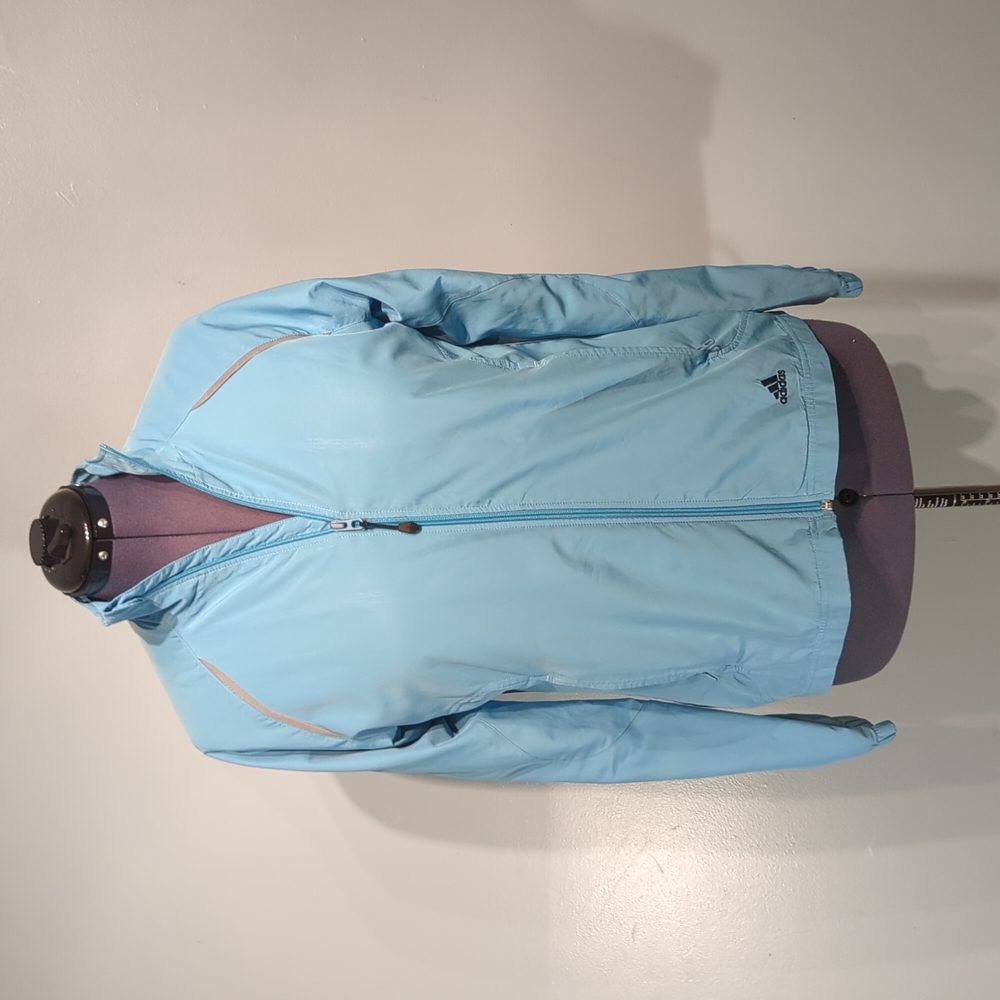 Adidas wind breaker size large light blue in color